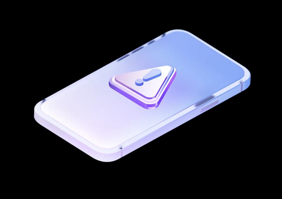 A phone lying face up with a warning sign floating above it